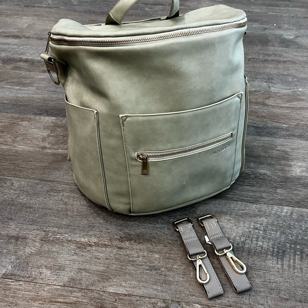 Fawn Design original diaper bag and stroller hooks.